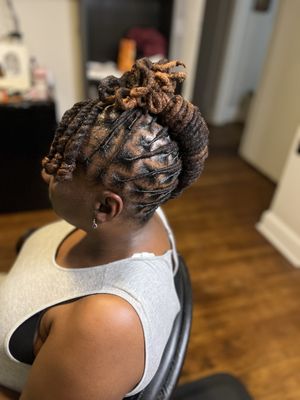 Styling - Your locs are a journey, and every stage deserves a look that’s uniquely you. We offer expert styling services to help you express your individuality while keeping your locs healthy and strong.