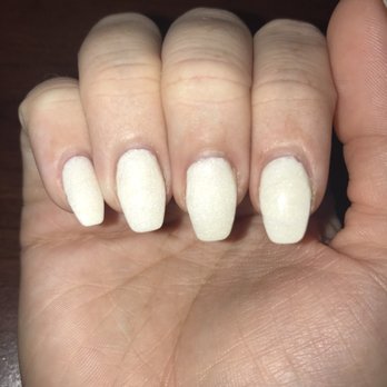 Bellagio Nails & Spa - Bad shape and you can see the uneven edges near the cuticle. - Nail Salons Near Me - Gainesville, Florida