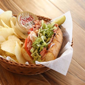 Dion's Pizza - a basket of chips and a sandwich - Pizza Near Me - Clovis, New Mexico