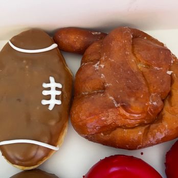 Pinkbox Doughnuts - I wasn't sure what the doughnut to the right was, until my aunt said it was a #1 fan sign! Now I see it! - Donuts Near Me - Henderson, Nevada Pinkbox Doughnuts - I wasn't sure what the doughnut to the right was, until my aunt said it was a #1 fan sign! Now I see it! - Donuts Near Me - Henderson, Nevada