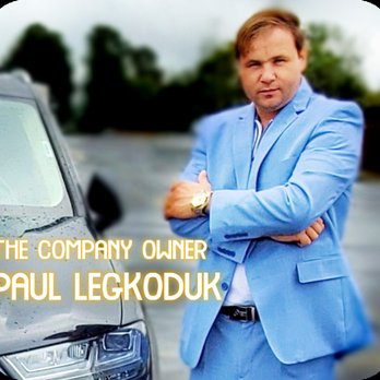 Pro Tile - a man in a blue suit standing next to a car - Flooring Near Me - Anderson, South Carolina
