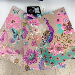 Tuesday Morning - Exquisite Gift Wrapping for Cheap!  Absolutely beautiful. Feels high-end. Would make the receiver feel so special!