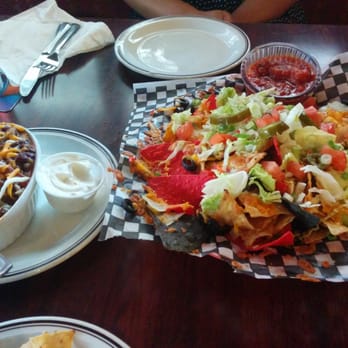 Abbey Road Pub & Patio - Single server nachoes with chilli on the side.. - Pubs Near Me - Mississauga, Ontario Abbey Road Pub & Patio - Single server nachoes with chilli on the side.. - Pubs Near Me - Mississauga, Ontario