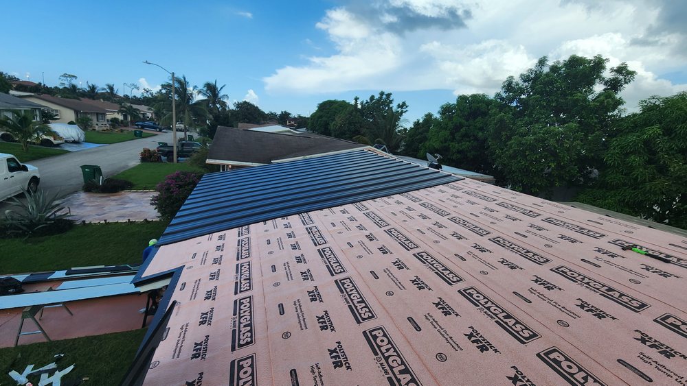 Slide of Dream Team Roofing