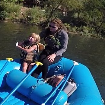 Whitewater Excitement - My daughter sitting with the guide. - Rafting/Kayaking Near Me - Lotus, California Whitewater Excitement - My daughter sitting with the guide. - Rafting/Kayaking Near Me - Lotus, California