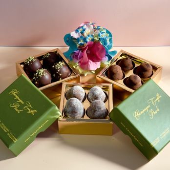 Vivian Ivy Chocolatiers - Classic and Dark Champagne Truffles with a side of Pistachio Truffles - Desserts Near Me - Novi, Michigan Vivian Ivy Chocolatiers - Classic and Dark Champagne Truffles with a side of Pistachio Truffles - Desserts Near Me - Novi, Michigan
