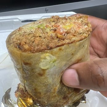 TAQUERiA La Chaparrita - Chorizo burrito jam packed - Food Trucks Near Me - Columbus, Ohio