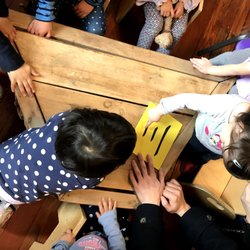 Philadelphia Chinese Academy - Our youngest students learning to trace Chinese characters written in sand paper with their fingers