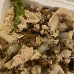 Moo goo Gai Pan. Note all of the mushrooms and the piece of undercooked chicken (cut it open) in the bottom left.
