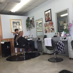 Kim's Hair Design - Kim knows her trade well and takes her time doing an exact cut.