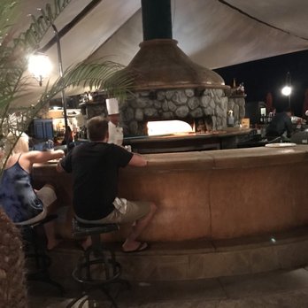 Bella California - Bar seating with view of the pizza oven at Bella California at the Villa del Palmar Resort in Cabo San Lucas, Mexico. - Pizza Near Me - Cabo San Lucas, BCS
