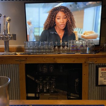 Bandana's Bar-B Q - St. Ann - Bar area with TV, four beers on tap etc - Barbeque Near Me - Saint Ann, Missouri Bandana's Bar-B Q - St. Ann - Bar area with TV, four beers on tap etc - Barbeque Near Me - Saint Ann, Missouri
