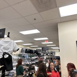 FlynnO'Hara Uniforms - Line to the back of the store due to only one cashier taking care of the store