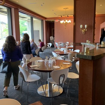Saffron Patch - Seating area which big windows looking over a parking lot - Indian Near Me - Beachwood, Ohio