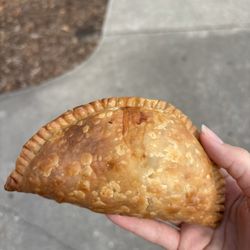 Empanada World Café - Sausage, egg, and cheese empanada