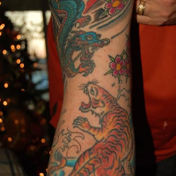 Tattoos By Advance - tiger & dragon 15 yrs old - Tattoo Near Me - Fremont, California Tattoos By Advance - tiger & dragon 15 yrs old - Tattoo Near Me - Fremont, California