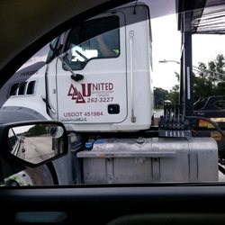 United Brothers Development - United Brothers Development is a danger to the public! This truck is clearly spilling debris all over the highway!