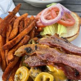 Burger with cheddar cheese, pickled jalapeño, & bacon Burger with cheddar cheese, pickled jalapeño, & bacon