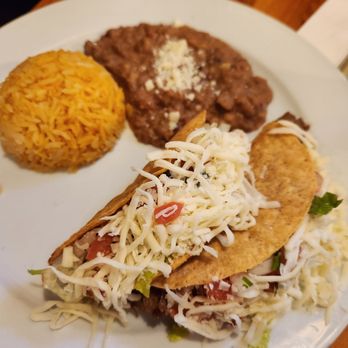 La Hacienda Mexican Restaurant - 2 crispy tacos combination, one of carnitas and shredded beef beans & rice. - Mexican Near Me - Goleta, California La Hacienda Mexican Restaurant - 2 crispy tacos combination, one of carnitas and shredded beef beans & rice. - Mexican Near Me - Goleta, California
