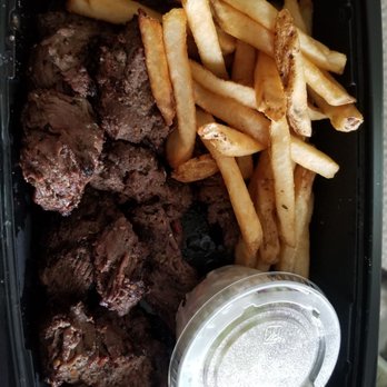 99 Restaurants - I ordered the king size steak tips with French fries and coleslaw,  this is what it looked like when we got home from picking it up - Pubs Near Me - Biddeford, Maine