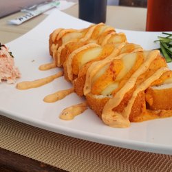 Niki Sushi - BBQ Roll (pollo y queso todo al horno) esto esta espectacular.