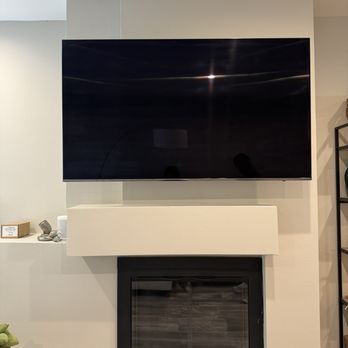 TVMounted - 65" TV mounted above our fireplace - TV Mounting Near Me