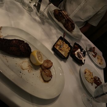 Steak 44 - My Petite Filet Mignon butterflies but pretty burnt and undercooked scallops with my boyfriend's Whole Colorado Rack of Lamb* ** across. - Steakhouses Near Me - Phoenix, Arizona Steak 44 - My Petite Filet Mignon butterflies but pretty burnt and undercooked scallops with my boyfriend's Whole Colorado Rack of Lamb* ** across. - Steakhouses Near Me - Phoenix, Arizona