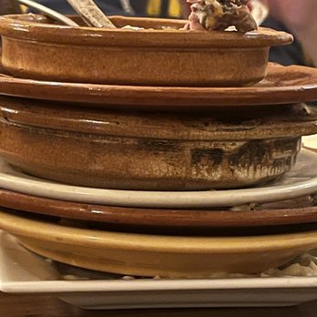 Barcelona Tapas - a stack of plates with ice cream - Tapas/Small Plates Near Me - New Orleans, Louisiana