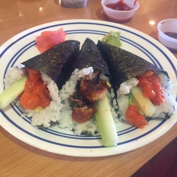 Sushi Ai - (Left to right): spicy salmon hand roll, salmon skin hand roll, spicy yellowtail hand roll - Sushi Bars Near Me - Goleta, California Sushi Ai - (Left to right): spicy salmon hand roll, salmon skin hand roll, spicy yellowtail hand roll - Sushi Bars Near Me - Goleta, California