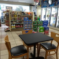 Your intimate dining space. There are actually three tables in this area and a two-seater by the front window if you prefer the view.