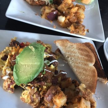 The Attic - Chicken Benedict (top) and Southern Scramble w/ avocado (bottom) - Breakfast & Brunch Near Me - Long Beach, California