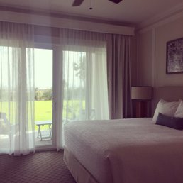 King suite opening out onto the lawn. Walk a few steps to the pool or beach!