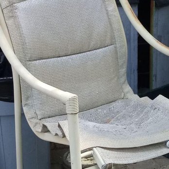 Lazy E Motor Inn - one of the patio chairs - Hotels Near Me - Laconia, New Hampshire Lazy E Motor Inn - one of the patio chairs - Hotels Near Me - Laconia, New Hampshire