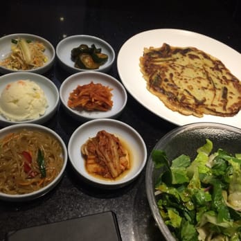 Shila Korean BBQ - Kimchee, pickled cucumber, daikon, salad and more sides - Barbeque Near Me - Clovis, California