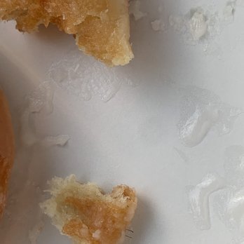 Krispy Kreme - There are mini strands of hair sticking out and done within the glaze - Donuts Near Me - Duluth, Georgia Krispy Kreme - There are mini strands of hair sticking out and done within the glaze - Donuts Near Me - Duluth, Georgia