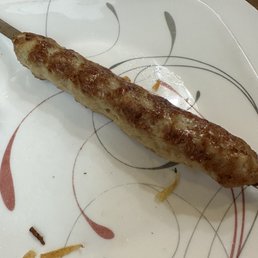 a sausage on a plate a sausage on a plate