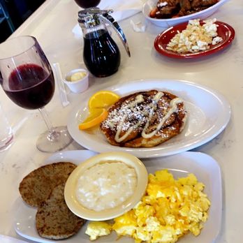 Ruby Sunshine Charlotte Southend - Chicken Sausage, grits, scrambled eggs w/cheddar, Cinnamon Swirl pancake, French Toast Chicken bites, Blueberry Mimosas - Breakfast & Brunch Near Me - Charlotte, North Carolina Ruby Sunshine Charlotte Southend - Chicken Sausage, grits, scrambled eggs w/cheddar, Cinnamon Swirl pancake, French Toast Chicken bites, Blueberry Mimosas - Breakfast & Brunch Near Me - Charlotte, North Carolina