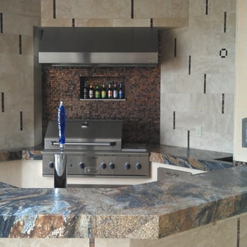 Kole's Tile - a kitchen counter with a grill - Flooring Near Me - San Marcos, California