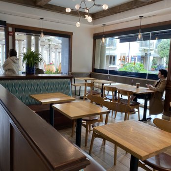 Tidal Coffee - people sitting at tables in a coffee shop - Cafes Near Me - Monterey, California Tidal Coffee - people sitting at tables in a coffee shop - Cafes Near Me - Monterey, California