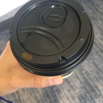 Another Broken Egg Cafe - Unsealed coffee and spilt all over lid; about 1/3 of cup was gone - Cafes Near Me - Atlanta, Georgia