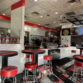 Pizzeria Undici - Inside, high top tables and stools - Pizza Near Me - Massapequa, New York Pizzeria Undici - Inside, high top tables and stools - Pizza Near Me - Massapequa, New York