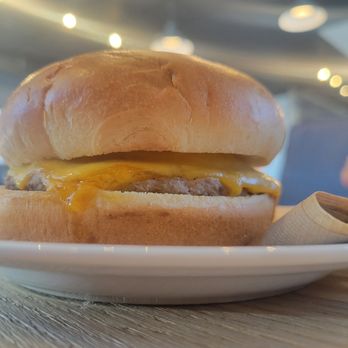 Coffee Fellows - Sausage egg and cheese breakfast sandwich. Hard as a hockey puck. - Coffee & Tea Near Me - Katy, Texas
