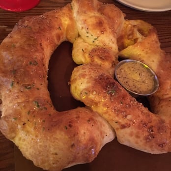 Taverna Rossa - Pretzel appetizer with the hot mustard dipping (warning: the sauce is very hot!) - Pizza Near Me - Plano, Texas Taverna Rossa - Pretzel appetizer with the hot mustard dipping (warning: the sauce is very hot!) - Pizza Near Me - Plano, Texas