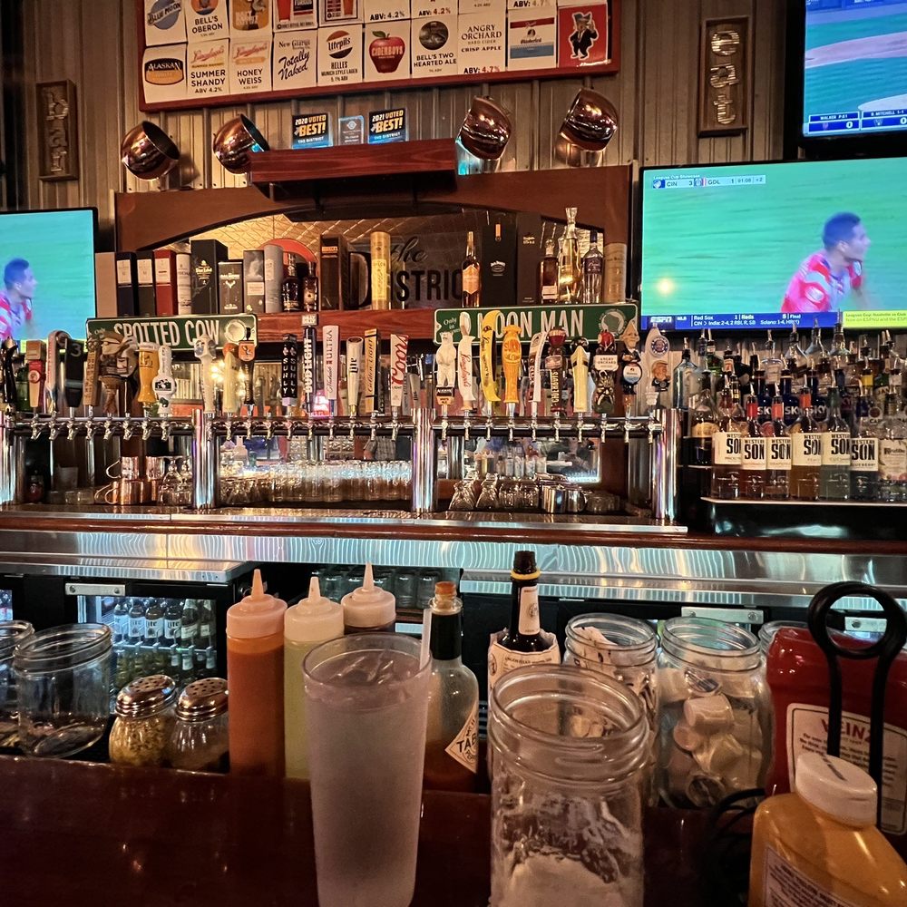 The District Pub & Grill - the bar and the televisions - New American Near Me - Eau Claire, Wisconsin The District Pub & Grill - the bar and the televisions - New American Near Me - Eau Claire, Wisconsin