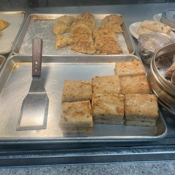Ocean Island - Turnip Cake: (Lo Bak Go). Traditionally It is made with rice flour, daikon radish, dried shrimp, dried scallops, and Chinese sausage. - Dim Sum Near Me - Monterey Park, California Ocean Island - Turnip Cake: (Lo Bak Go). Traditionally It is made with rice flour, daikon radish, dried shrimp, dried scallops, and Chinese sausage. - Dim Sum Near Me - Monterey Park, California