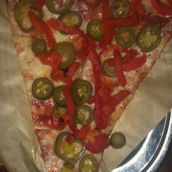 Talarico's Pizzeria - pizza with jalapeños and peppers on top. - Pizza Near Me - Seattle, Washington Talarico's Pizzeria - pizza with jalapeños and peppers on top. - Pizza Near Me - Seattle, Washington