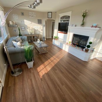 Best Floors - a living room with hardwood floors - Flooring Near Me