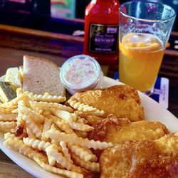 Brewski's Sports Club Bar & Grill - Beer battered Fish and Chips ($16). So good and huge proportions.