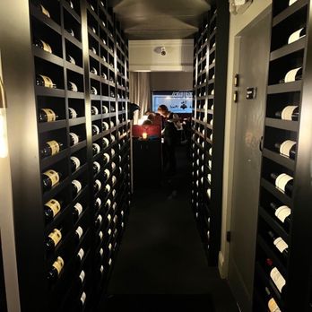 The Black Pearl - Wine hallway between dining and restrooms - New American Near Me - Dunedin, Florida The Black Pearl - Wine hallway between dining and restrooms - New American Near Me - Dunedin, Florida