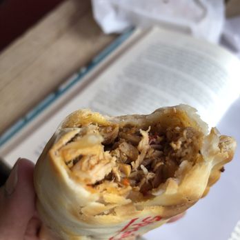 KK's Cafe - a hand holding a burrito - Cafes Near Me - Bayonne, New Jersey KK's Cafe - a hand holding a burrito - Cafes Near Me - Bayonne, New Jersey